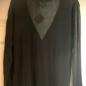 Sheer black high low hem, long sleeve cardigan. Size medium. NWT.